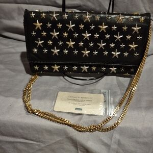 Jimmy Choo Black Clutch with Gold Star Accents
